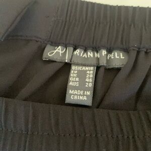 NWT flowy dress pants. Black with sheer overlay. Gorgeous wide legs.